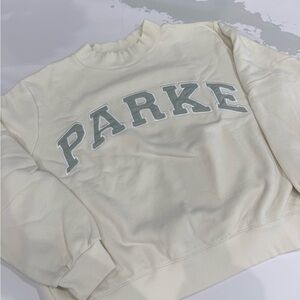 Cream Sweatshirt with Gray Lettering